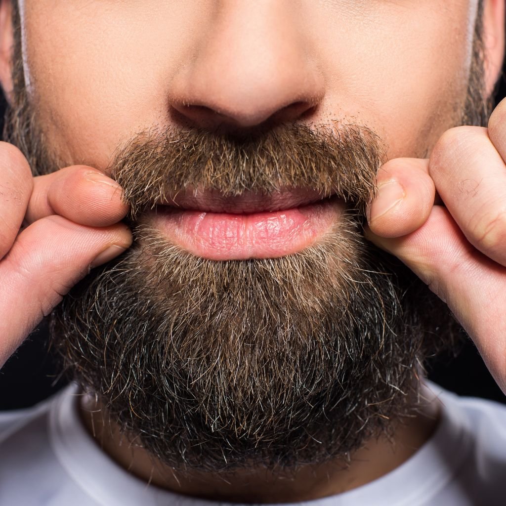 A close up of a man's beard